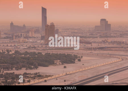 UAE, Dubai, Downtown Dubai, elevated desert and highway view towards Ras Al Khor, dawn Stock Photo