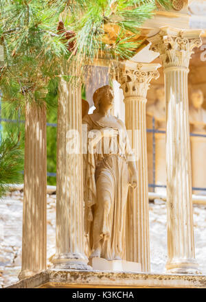 Beautiful statue in Greek Orthodox cemetery in Ermoupolis, Syros Greece Stock Photo