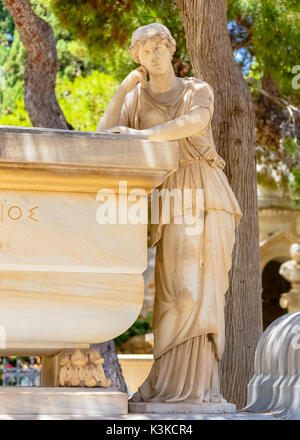 Beautiful statue in Greek Orthodox cemetery in Ermoupolis, Syros Greece Stock Photo