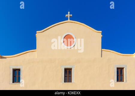 St. Georgio church details against a clear blue sky in Ano Syros, Cyclades, Greece. Ano Syos is located near the former municipality of Syros island. Stock Photo