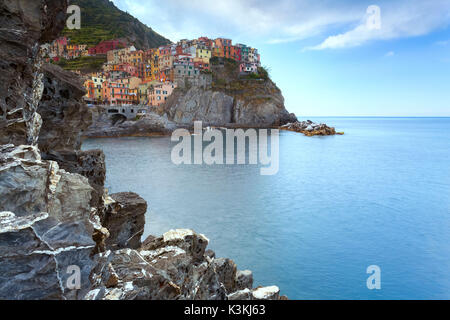 Europe, Italy, Liguria, Cinque Terre. Manarola among the rocks Stock Photo