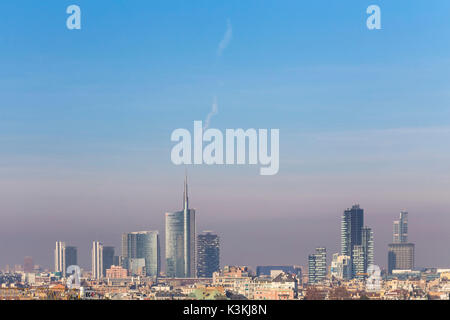 Unicredit Tower and the skyscrapers of Porta Nuova district from the rooftop of the Duomo di Milano, Milan, Lombardy, Italy. Stock Photo