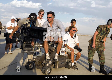 TRANSFORMERS [?], [?], Director MICHAEL BAY [standing centre, in background, wearing white], [?], Cinematographer MITCHELL AMUNDSEN [seated, wearing white shirt, with camera lens], [?], [?]        Date: 2007 Stock Photo