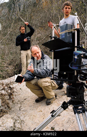 CAVE OF FORGOTTEN DREAMS Director WERNER HERZOG CAVE OF FORGOTTEN DREAMS [CAN / US / FR / GER / BR 2010] Director WERNER HERZOG [crouching]     Date: 2010 Stock Photo