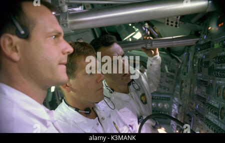 APOLLO 13 [US 1995] [L-R] BILL PAXTON as Fred Haise, KEVIN BACON as Jack Swigert, TOM HANKS as Jim Lovell     Date: 1995 Stock Photo