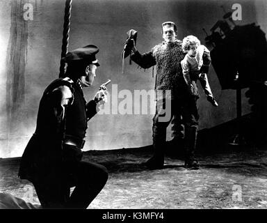 SON OF FRANKENSTEIN [US 1939] LIONEL ATWILL, BORIS KARLOFF as The Monster, DONNIE DUNAGAN [child actor]     Date: 1939 Stock Photo