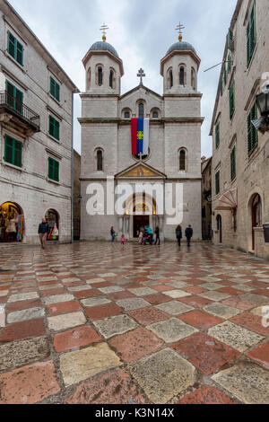 The church of St. Nikola (Sveti Nikola). On the external facade there is the flag of the Serbian Orthodox Church. Kotor, Montenegro Stock Photo