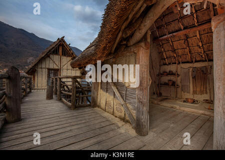 On the shores of the lake of Lago is the Archeopark Livelet (archaeological park educational). The entire structure is built on stilts; in the area there are three huts, realized in real scale, a house on stilts is supported by solid piles directly on the water, one is completely built on the mainland, and a third is made half on land and half on water. Livelet, Revine Lago, Treviso Stock Photo