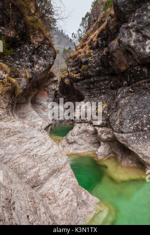 Erosion in the deep canyon carved by the water at the beginning of the val pegolera, National Park of Dolomiti Bellunesi, Monti del Sole Stock Photo