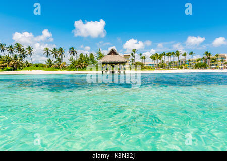 Playa Blanca, Punta Cana, Dominican Republic, Caribbean Sea. Thatched hut on the beach. Stock Photo