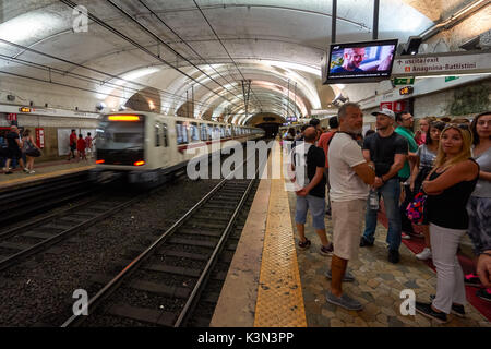 Tourists at the Colosseo underground station in Rome, Italy Stock Photo