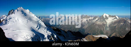 View from Nadelhorn summit, (Dome de Mischabel on the left) Switzerland, Europe Stock Photo