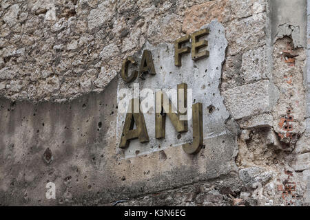 Eastern Europe, Mostar, Bosnia and Herzegovina.  The marks of war in the Balkans on the walls of the city. Stock Photo