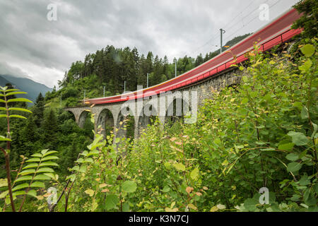 Red Bernina Express train, Filisur, Graubunden, Switzerland Stock Photo