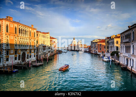 Italy, Veneto, Venice. Grand Canal and Santa Maria della Salute church from Accademy Bridge. Stock Photo