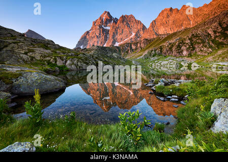 Italy, Piedmont, Cuneo District, Po Valley, Crissolo - Summer sunrise at Superiore Lake Stock Photo