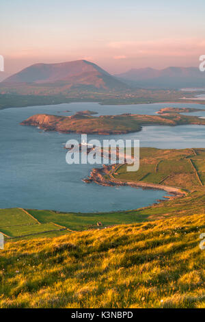 Valentia island (Oilean Dairbhre), County Kerry, Munster province, Ireland, Europe. View from the Geokaun mountain and Fogher cliffs at sunset. Stock Photo