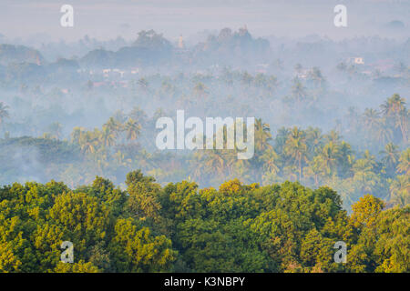 Mrauk-U, Rakhine state, Myanmar. Mrauk-U valley in a foggy sunrise seen from the Shwetaung pagoda. Stock Photo