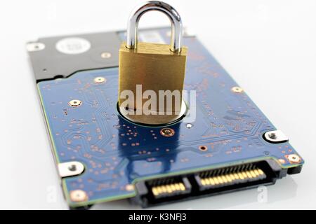 An concept image of a hard drive with a lock Stock Photo - Alamy