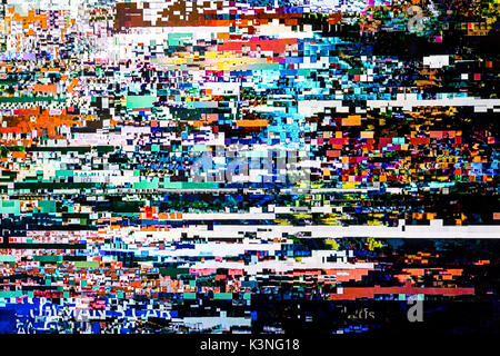 A pixelated image on a television due to a weak signal Stock Photo