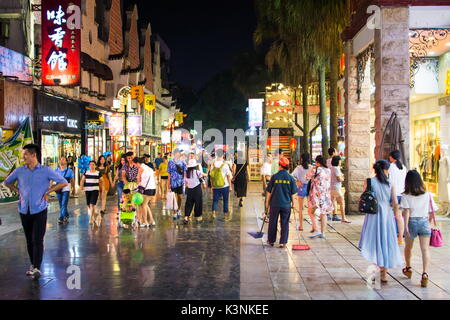 GUILIN, CHINA - JUNE 11, 2017: People in the Zhengyang, famous walking street, visited by many local and foreign tourists. Primarily meant for recreat Stock Photo