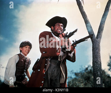 TREASURE ISLAND [US / BR 1950] BOBBY DRISCOLL as Jim Hawkins, ROBERT NEWTON as Long John Silver     Date: 1950 Stock Photo