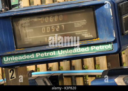 redundant petrol pumps disused at a derelict garage no longer selling petrol or diesel fuels of the future gasoline derv out of use rusty fuel petrol Stock Photo