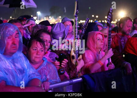Thousands of revellers enjoy the music of Status Quo at this year's Rewind Festival South 2017 of music of the 80's on its first day Stock Photo