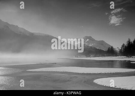 Foggy day in Engadina, switzerland. Stock Photo