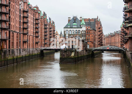 The picturesque water castle between bridges in the center of the canal Poggenmühlenbrücke Altstadt Hamburg Germany Europe Stock Photo