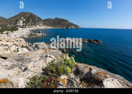 View of cliffs and headlands surrounding the blue sea Punta Molentis Villasimius Cagliari Sardinia Italy Europe Stock Photo