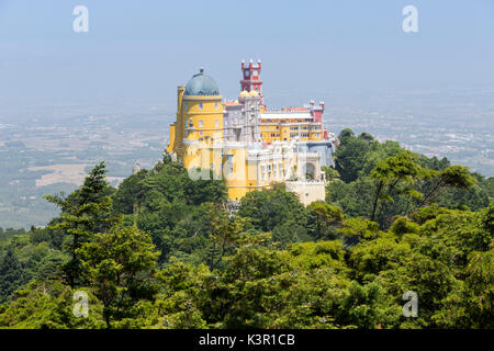 The colorful and decorated castle Palácio da Pena on top of hill São Pedro de Penaferrim Sintra Lisbon district Portugal Europe Stock Photo