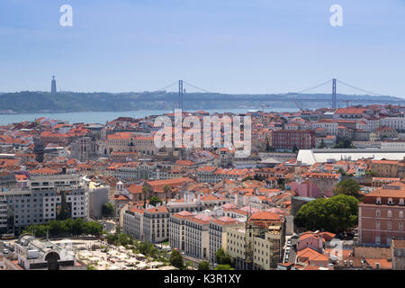 City view with Ponte 25 de Abril in background one of the largest suspension bridge in the world Lisbon Portugal Europe Stock Photo