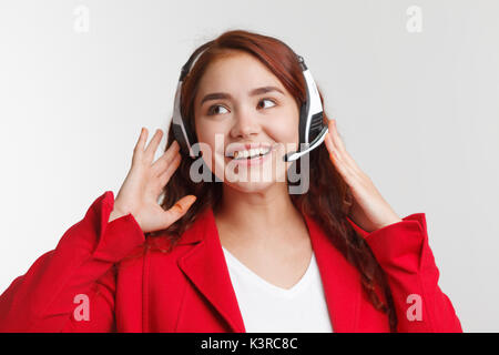 Support phone operator in headset, studio on white background Stock Photo