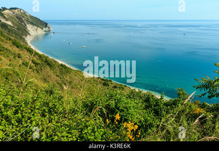 Summer Adriatic sea bay and Spiaggia Mezzavalle beach near Portonovo and Ancona towns in the Marche region. Italy, Conero Riviera. Stock Photo