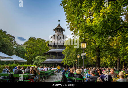 Beer garden at the Chinese Tower in the English Garden, Munich, Upper Bavaria, Bavaria, Germany, Europe Stock Photo