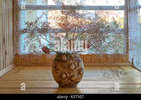 Still life with dried flowers in russian country house Stock Photo