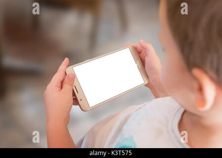 Boy play game on smart phone. Isolated screen of mobile for game app presentation. Stock Photo
