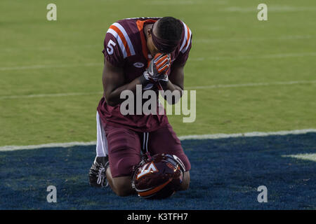 Landover, Maryland, USA. 3rd Sep, 2017. Wide Receiver CAM PHILLIPS (5) prays before the game held at FEDEX Field in Landover, Maryland. Credit: Amy Sanderson/ZUMA Wire/Alamy Live News Stock Photo