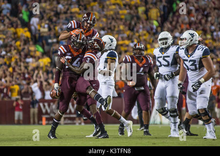 Landover, Maryland, USA. 3rd Sep, 2017. Hokies cornerback GREG STROMAN (3), defensive end TREVON HILL (94), and defensive end VINNY MIHOTA (99) celebrate during the game held at FEDEX Field in Landover, Maryland. Credit: Amy Sanderson/ZUMA Wire/Alamy Live News Stock Photo