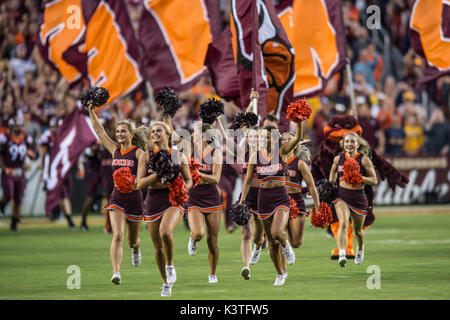 Landover, Maryland, USA. 3rd Sep, 2017. Virginia Tech cheerleaders run out onto the field before the game held at FEDEX Field in Landover, Maryland. Credit: Amy Sanderson/ZUMA Wire/Alamy Live News Stock Photo