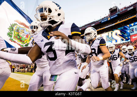 Landover, Maryland, USA. 03rd Sep, 2017. West Virginia takes the field before the NCAA football game between the West Virginia Mountaineers and the Virginia Tech Hokies at FedExField in Landover, Maryland. Scott Taetsch/CSM/Alamy Live News Stock Photo