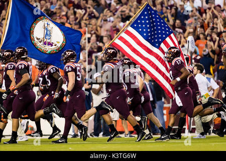 Landover, Maryland, USA. 03rd Sep, 2017. Virginia Tech takes the field before the NCAA football game between the West Virginia Mountaineers and the Virginia Tech Hokies at FedExField in Landover, Maryland. Scott Taetsch/CSM/Alamy Live News Stock Photo