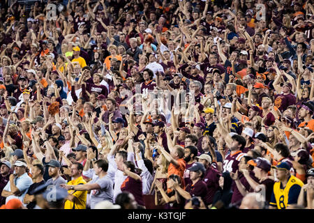 Landover, Maryland, USA. 03rd Sep, 2017. Fans celebrate late in the fourth quarter of the NCAA football game between the West Virginia Mountaineers and the Virginia Tech Hokies at FedExField in Landover, Maryland. Scott Taetsch/CSM/Alamy Live News Stock Photo