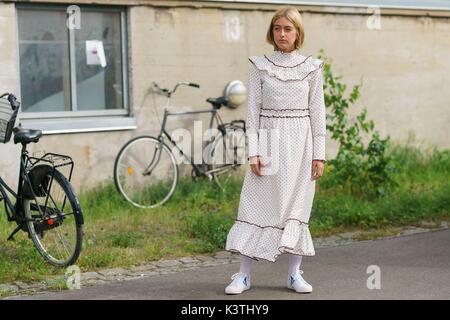 Emili Sindlev posing outside the Ganni runway show during Copenhagen Fashion Week - Aug 10, 2017 - Photo: Runway Manhattan/Grace Lunn ***For Editorial Use Only*** | usage worldwide Stock Photo