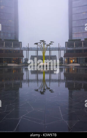 Milan, Lombardy, Italy. Gae Aulenti Square with iconic streetlights. Stock Photo