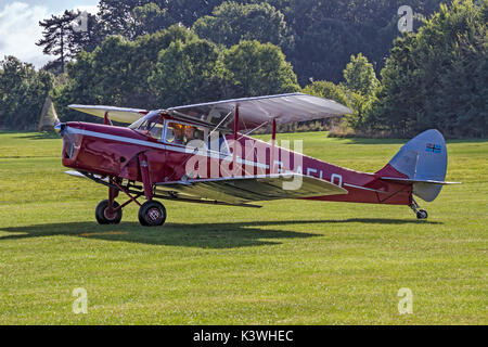 Mark Miller's 1936 DH.87B Hornet Moth taxying in at Old Warden for Shuttleworth Race Day 2016. Stock Photo