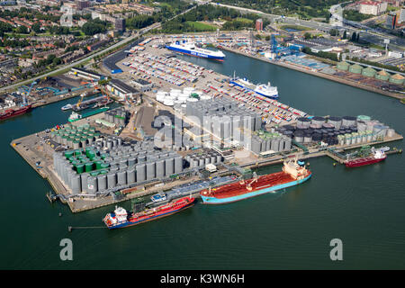 ROTTERDAM, THE NETHERLANDS - SEP 2, 2017: Aerial view of a oil and container terminal with moored ships in the Port of Rotterdam. Stock Photo