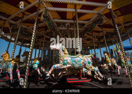 Brighton Pier formerly know as Palace Pier is a major visitor attraction on the seafront. A carousel Stock Photo