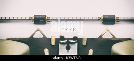 Close-up of word FREE on a typewriter sheet Stock Photo